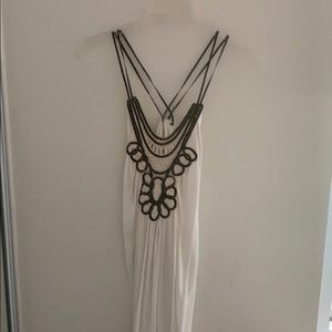 White tunic with cross back and beautiful details